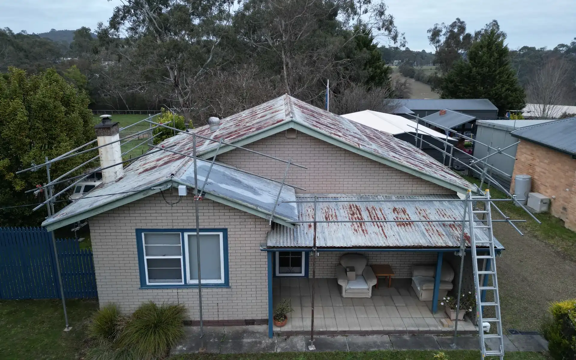 Rusted roof being repaired in the Yarra Valley
